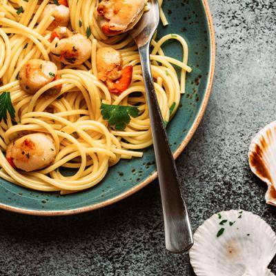 Meeresfrüchte mit Nudeln nach griechischer Art (scharf)